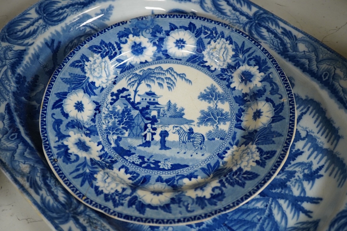 A Victorian blue and white pottery dish and two plates, one Wedgwood, largest 43cm